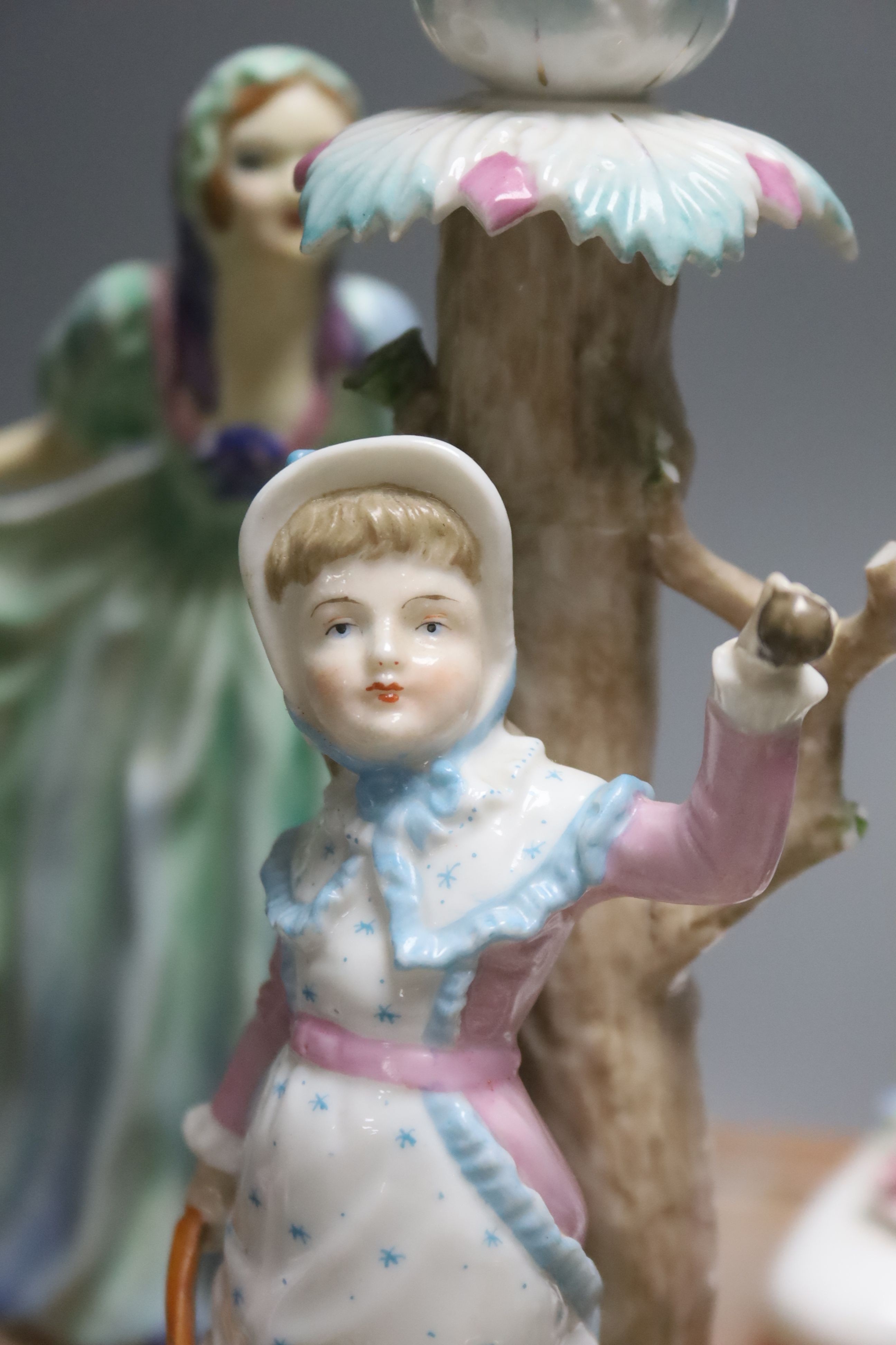 An early Royal Doulton figurine, height 17cm, together with mixed Continental ceramics